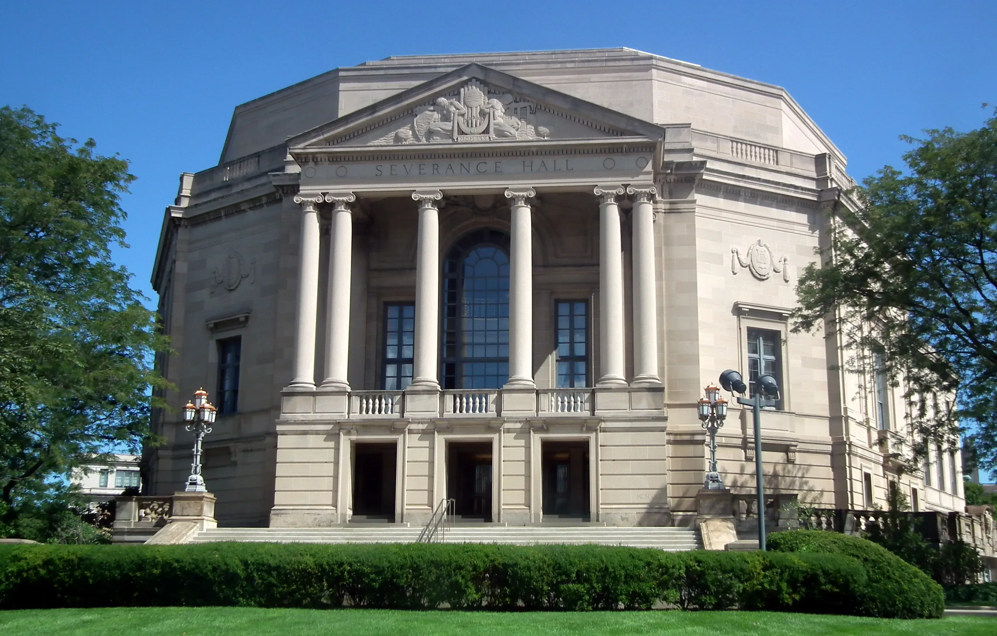 Exterior of Severance Hall, home of The Cleveland Orchestra, on a sunny day.